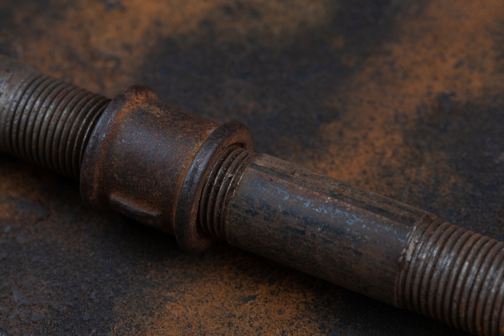 Rusty,Plumb,Tube,On,Rusty,Metal,Wall,Background